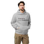 Athletic Heather oversized hoodie worn by man, oversized silhouette with “CREATE with PURPOSE” print