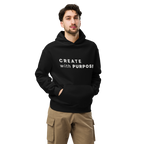 Black oversized hoodie worn by man, oversized silhouette with “CREATE with PURPOSE” print