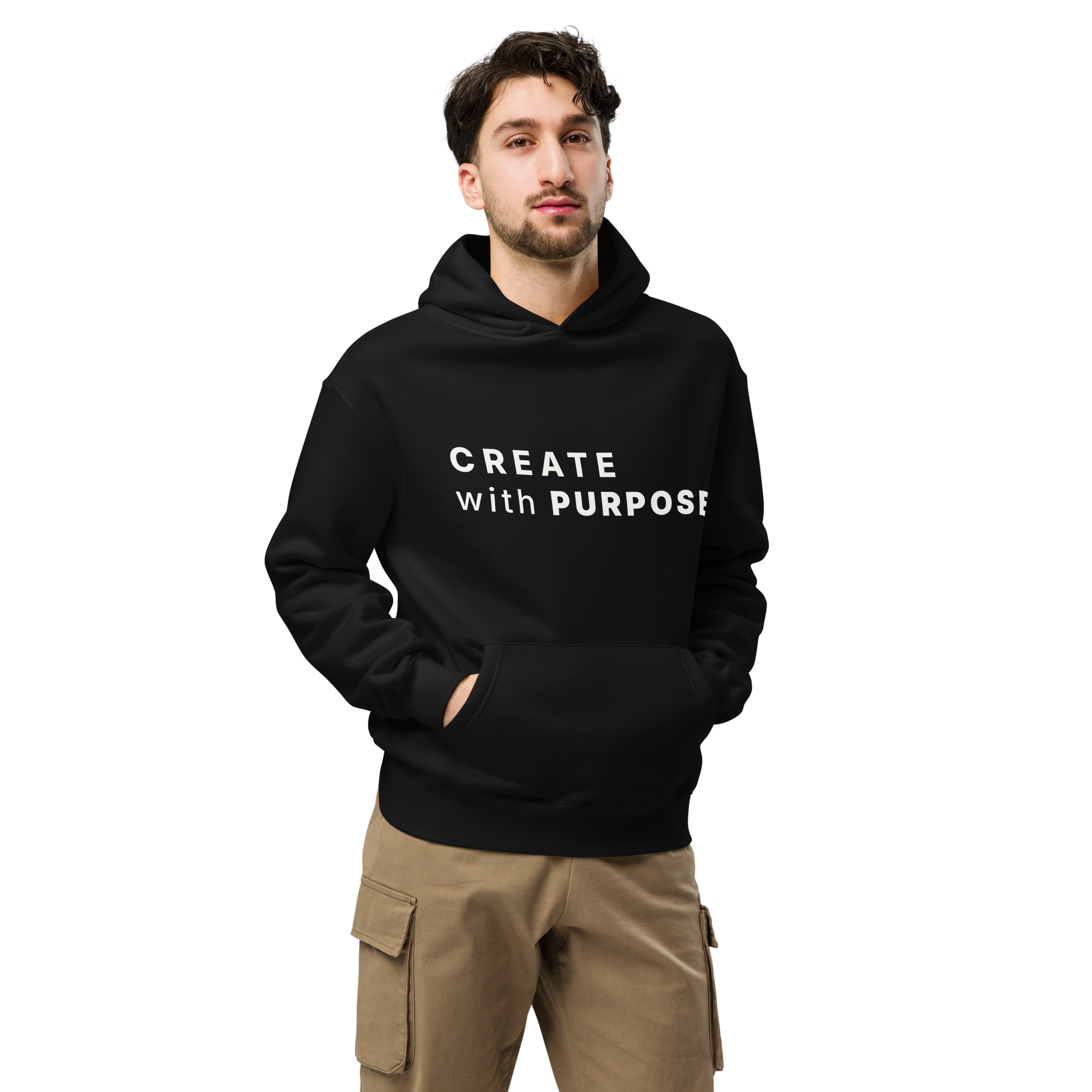 Black oversized hoodie worn by man, oversized silhouette with “CREATE with PURPOSE” print