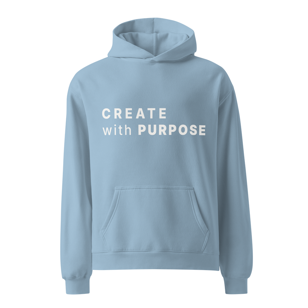 Carolina Blue oversized hoodie with “CREATE with PURPOSE” printed on the front