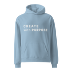 Carolina Blue oversized hoodie with “CREATE with PURPOSE” printed on the front