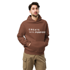 Chestnut oversized hoodie worn by man, oversized silhouette with “CREATE with PURPOSE” print