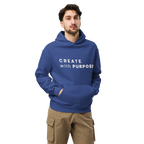 Cobalt oversized hoodie worn by man, oversized silhouette with “CREATE with PURPOSE” print