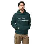 Pine Green oversized hoodie worn by man, oversized silhouette with “CREATE with PURPOSE” print