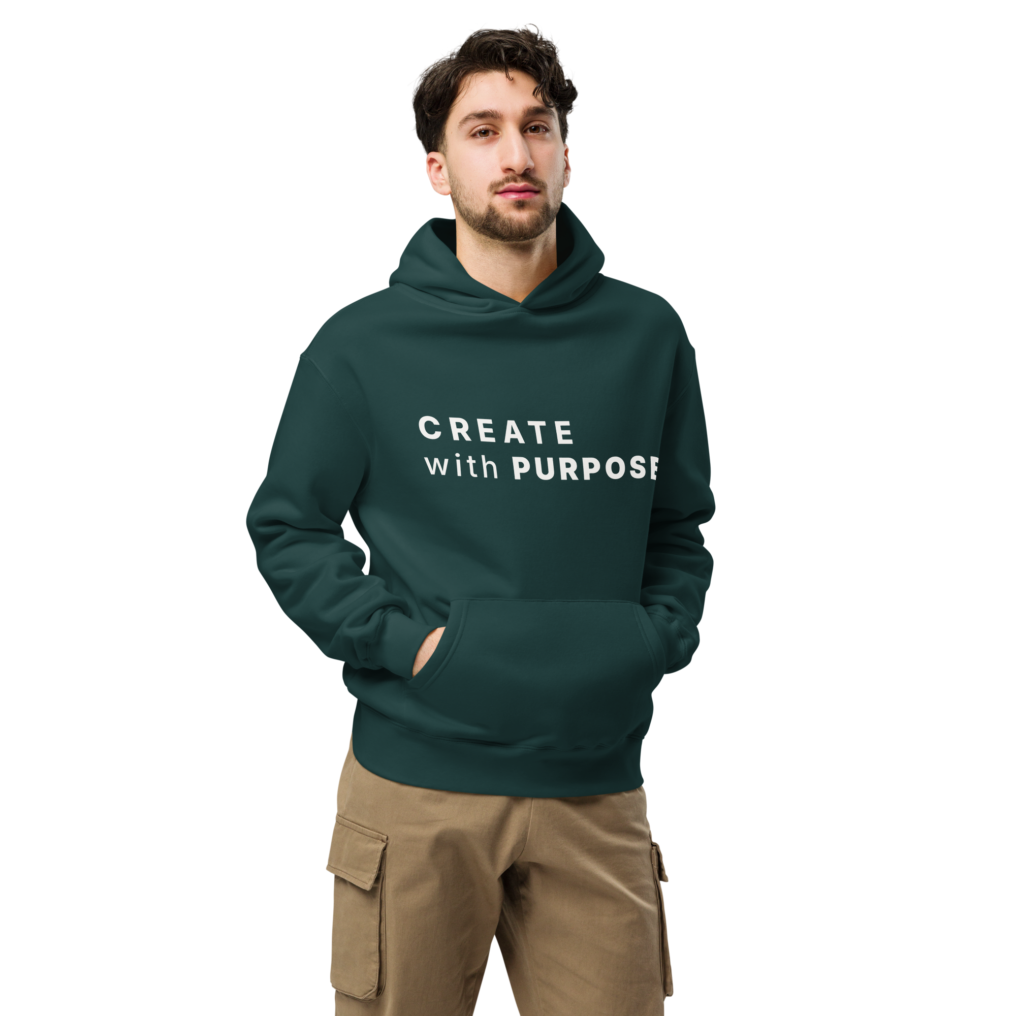 Pine Green oversized hoodie worn by man, oversized silhouette with “CREATE with PURPOSE” print