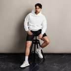 White oversized hoodie editorial lifestyle worn by model sitting – The Pixel Wolf