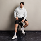 White Heather oversized hoodie editorial lifestyle worn by model sitting – The Pixel Wolf
