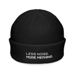 Black fisherman beanie front view with Less Noise More Meaning embroidery
