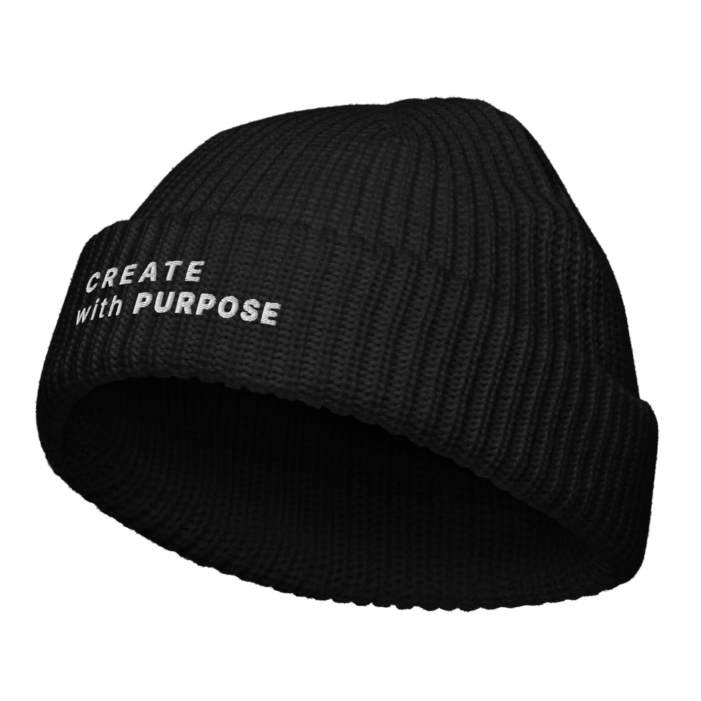 Black fisherman beanie angled view with “CREATE WITH PURPOSE” embroidery – The Pixel Wolf