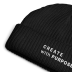 Black ribbed knit fisherman beanie detail showing “CREATE WITH PURPOSE” embroidery – The Pixel Wolf