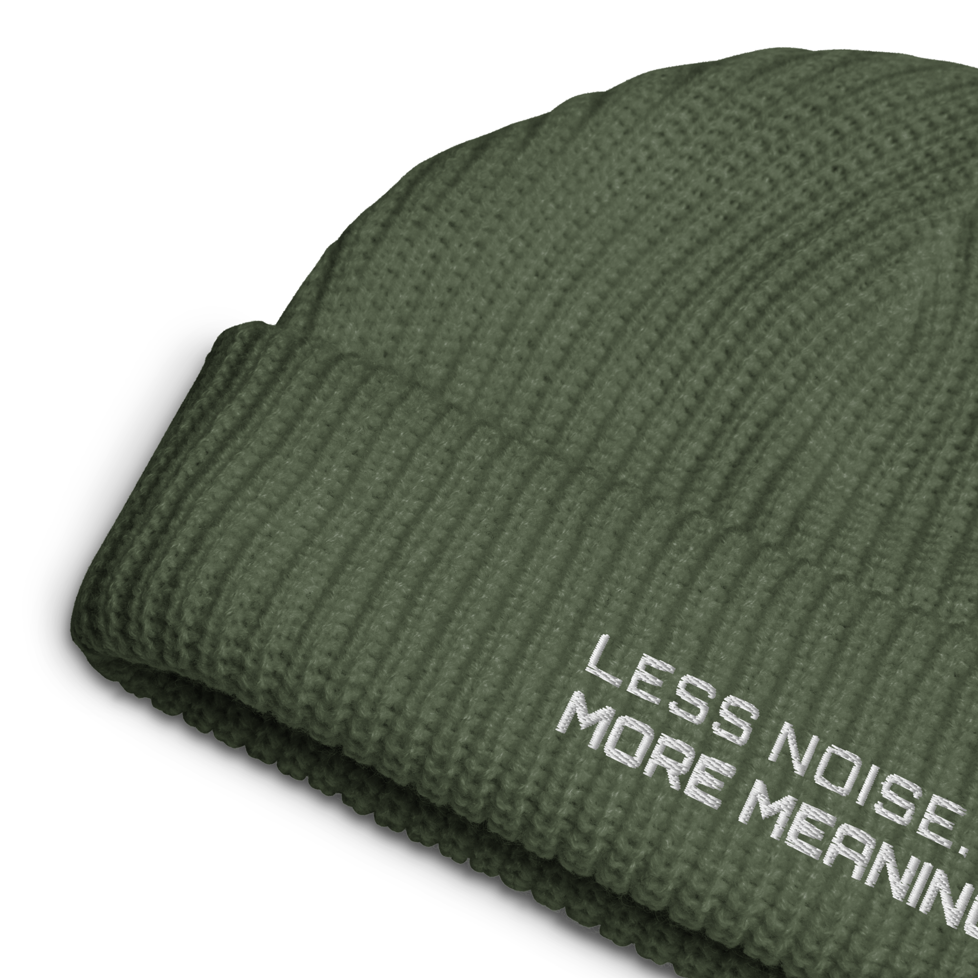 Cypress fisherman beanie close-up showing embroidered Less Noise More Meaning slogan