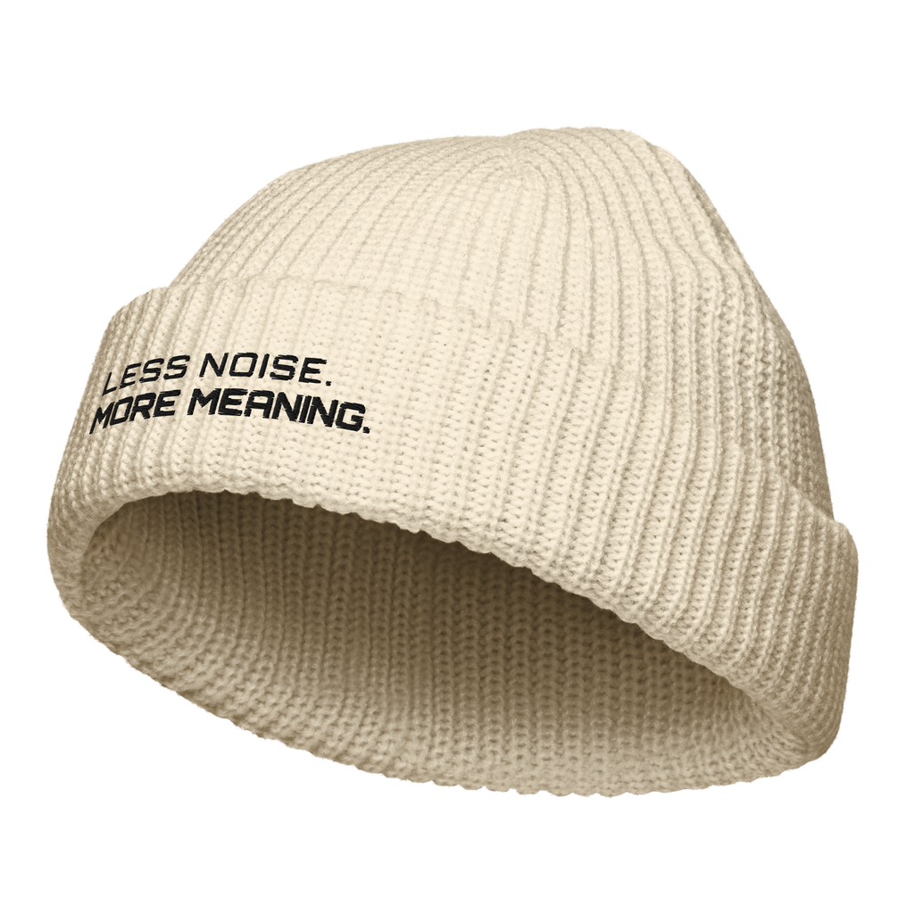 Ecru fisherman beanie angled view showing ribbed knit texture