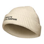 Ecru fisherman beanie angled view with “CREATE WITH PURPOSE” embroidery – The Pixel Wolf