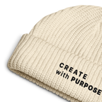 Ecru ribbed knit fisherman beanie detail showing “CREATE WITH PURPOSE” embroidery – The Pixel Wolf