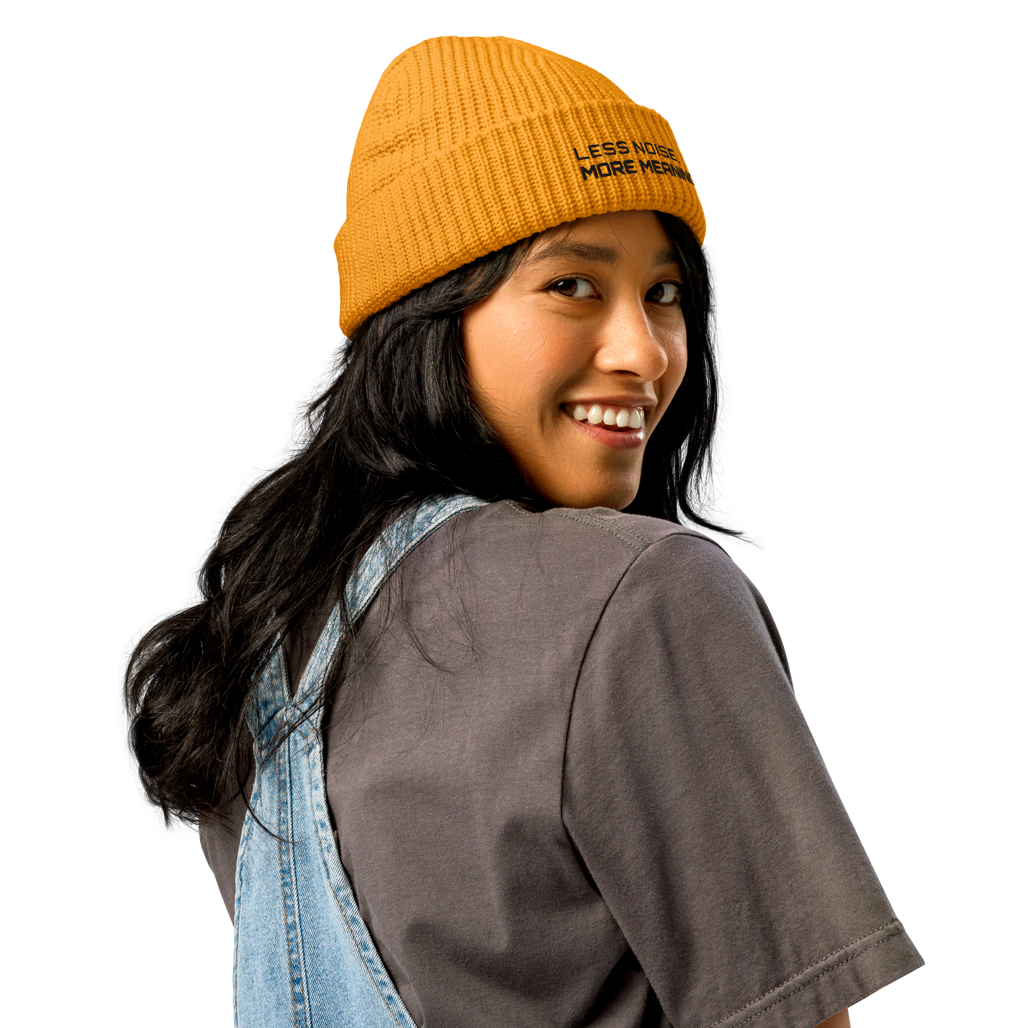Gold fisherman beanie worn in lifestyle setting with minimalist outfit