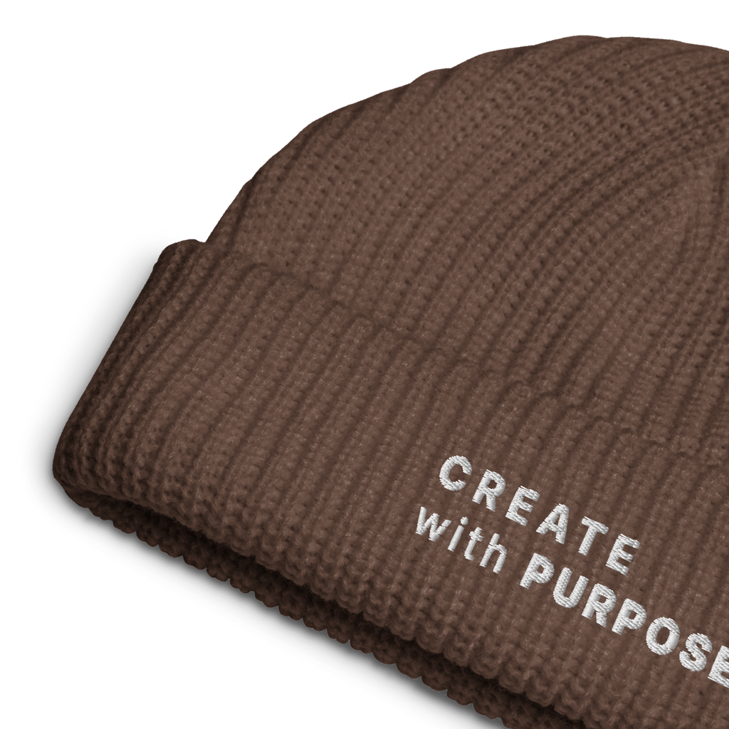 Walnut ribbed knit fisherman beanie detail showing “CREATE WITH PURPOSE” embroidery – The Pixel Wolf