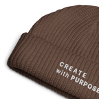 Walnut ribbed knit fisherman beanie detail showing “CREATE WITH PURPOSE” embroidery – The Pixel Wolf