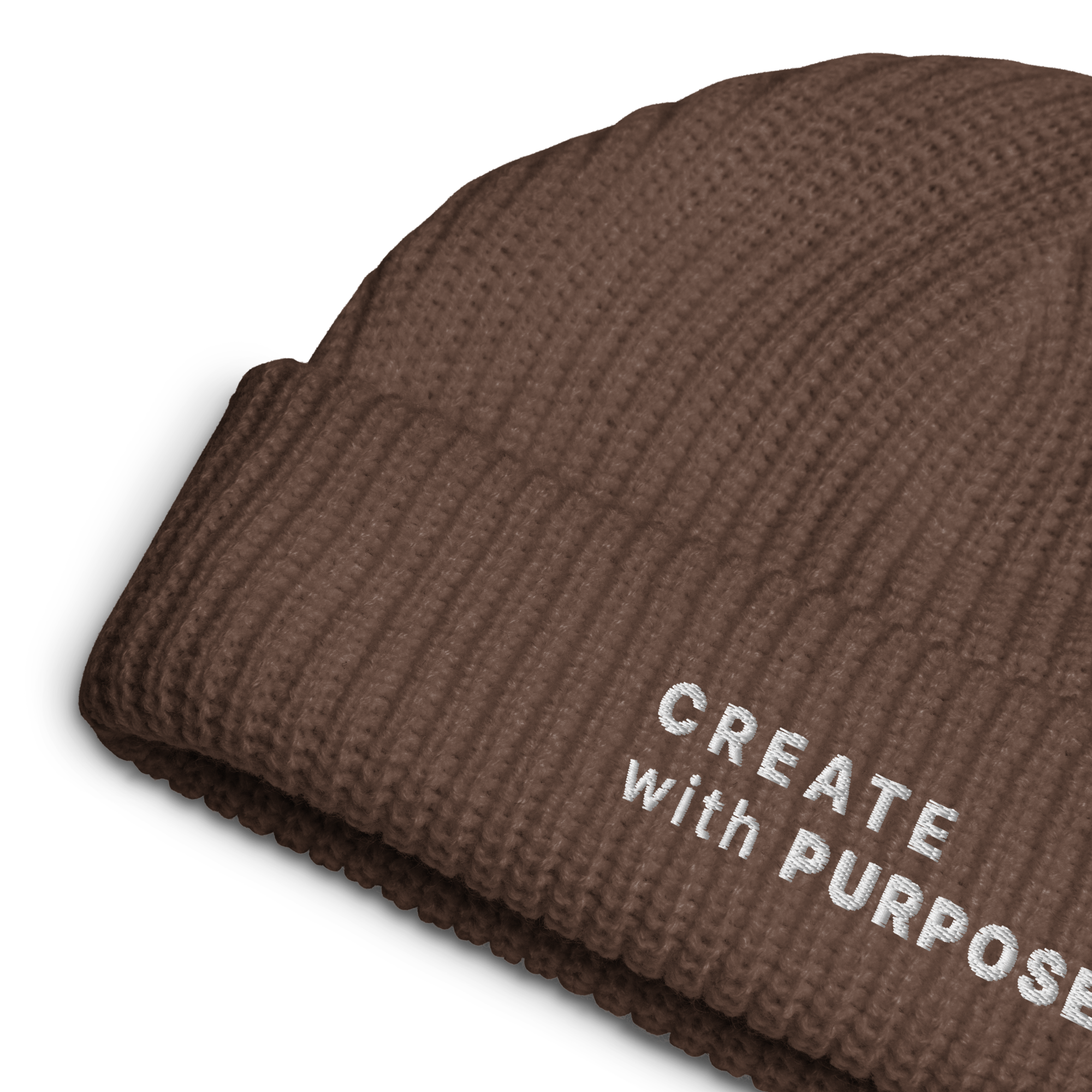 Walnut ribbed knit fisherman beanie detail showing “CREATE WITH PURPOSE” embroidery – The Pixel Wolf