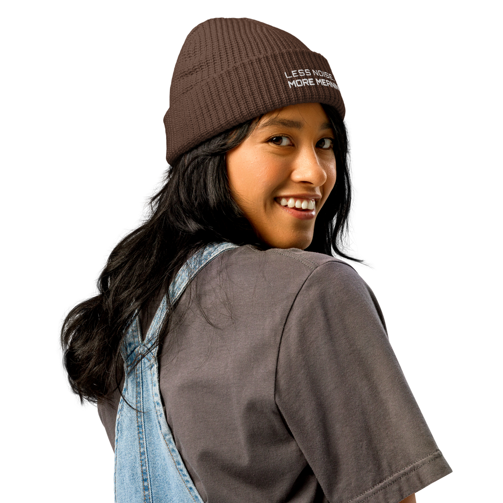 Walnut fisherman beanie worn in lifestyle setting with minimalist outfit
