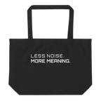 Black large organic tote bag front view with “Less Noise More Meaning” print – The Pixel Wolf