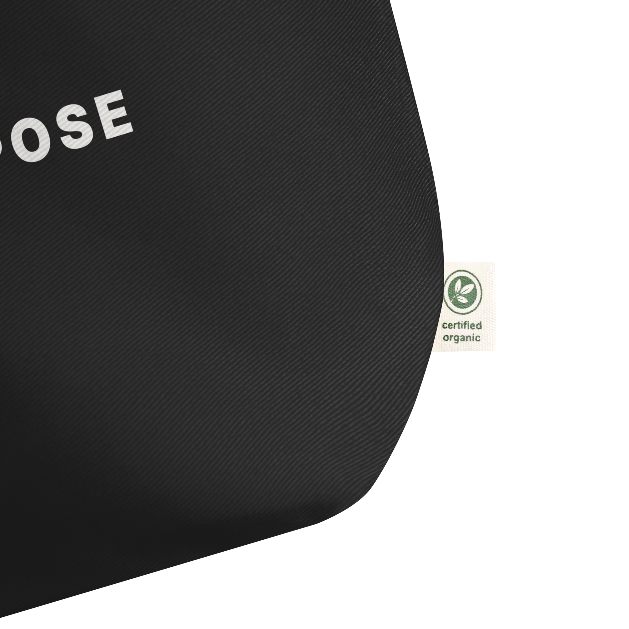 Black organic cotton tote bag detail showing print and fabric texture