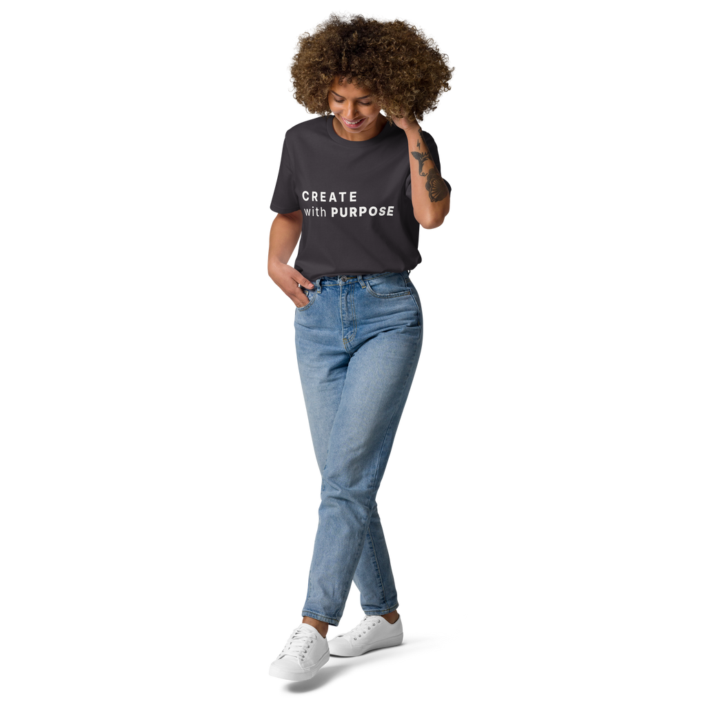 Anthracite organic cotton t-shirt lifestyle photo of woman wearing “CREATE with PURPOSE”