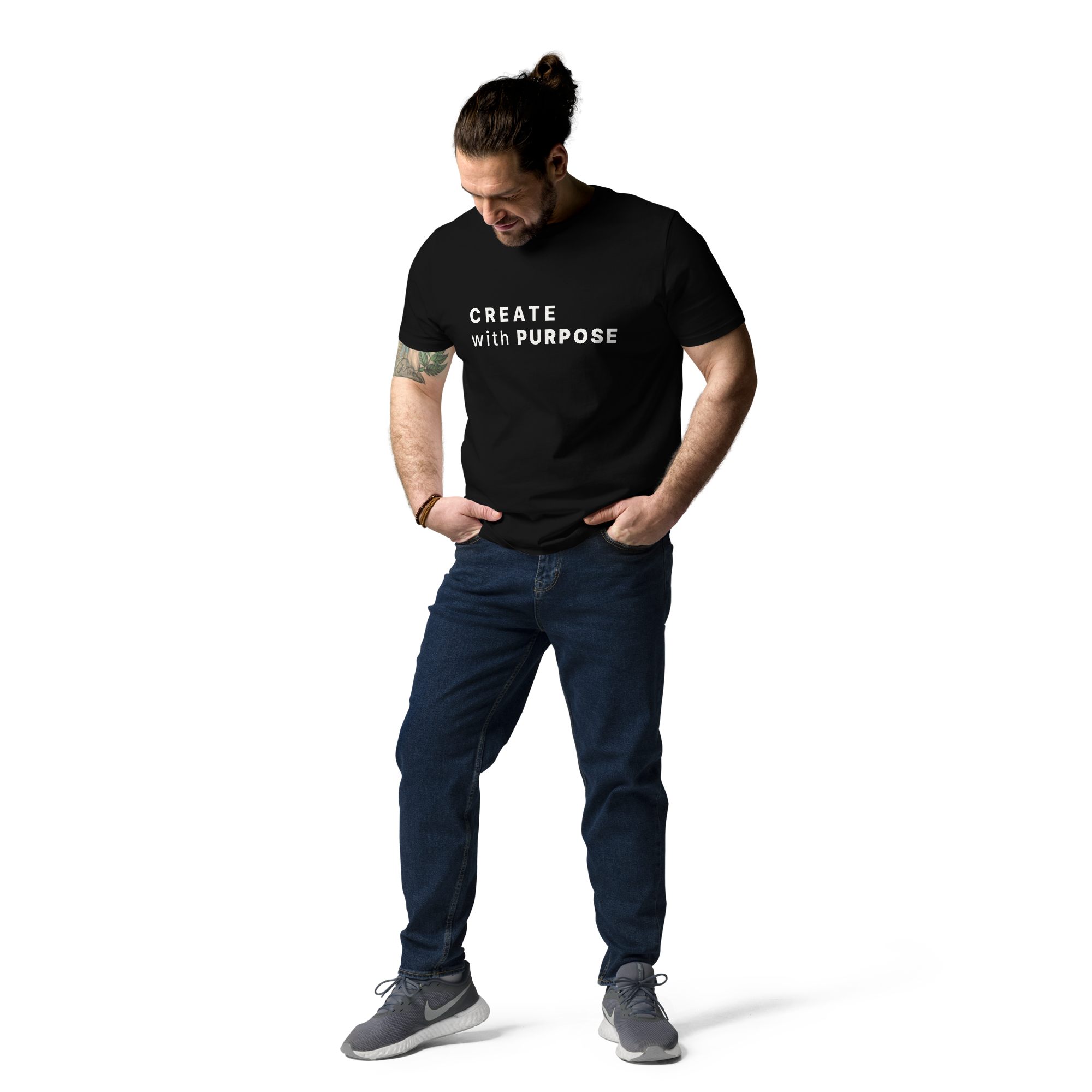 Black organic cotton t-shirt lifestyle photo of man wearing “CREATE with PURPOSE”