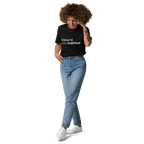 Black organic cotton t-shirt lifestyle photo of woman wearing “CREATE with PURPOSE”
