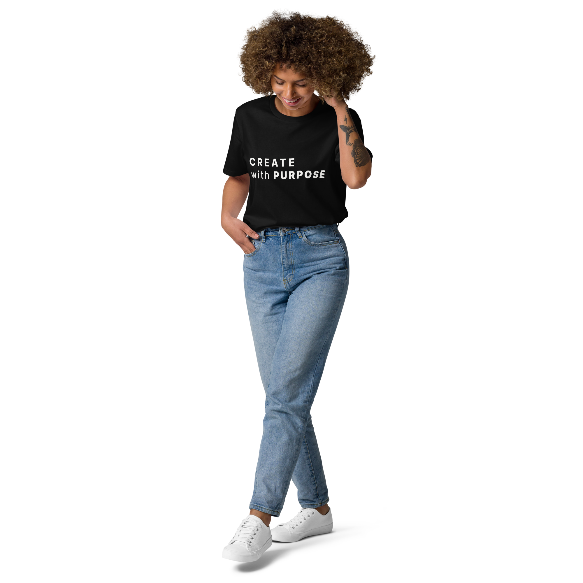 Black organic cotton t-shirt lifestyle photo of woman wearing “CREATE with PURPOSE”