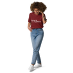Burgundy organic cotton t-shirt lifestyle photo of woman wearing “CREATE with PURPOSE”