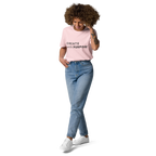 Cotton Pink organic cotton t-shirt lifestyle photo of woman wearing “CREATE with PURPOSE”