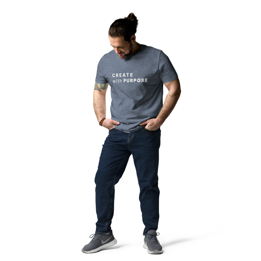 Dark Heather Blue organic cotton t-shirt lifestyle photo of man wearing “CREATE with PURPOSE”
