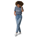 Dark Heather Blue organic cotton t-shirt lifestyle photo of woman wearing “CREATE with PURPOSE”