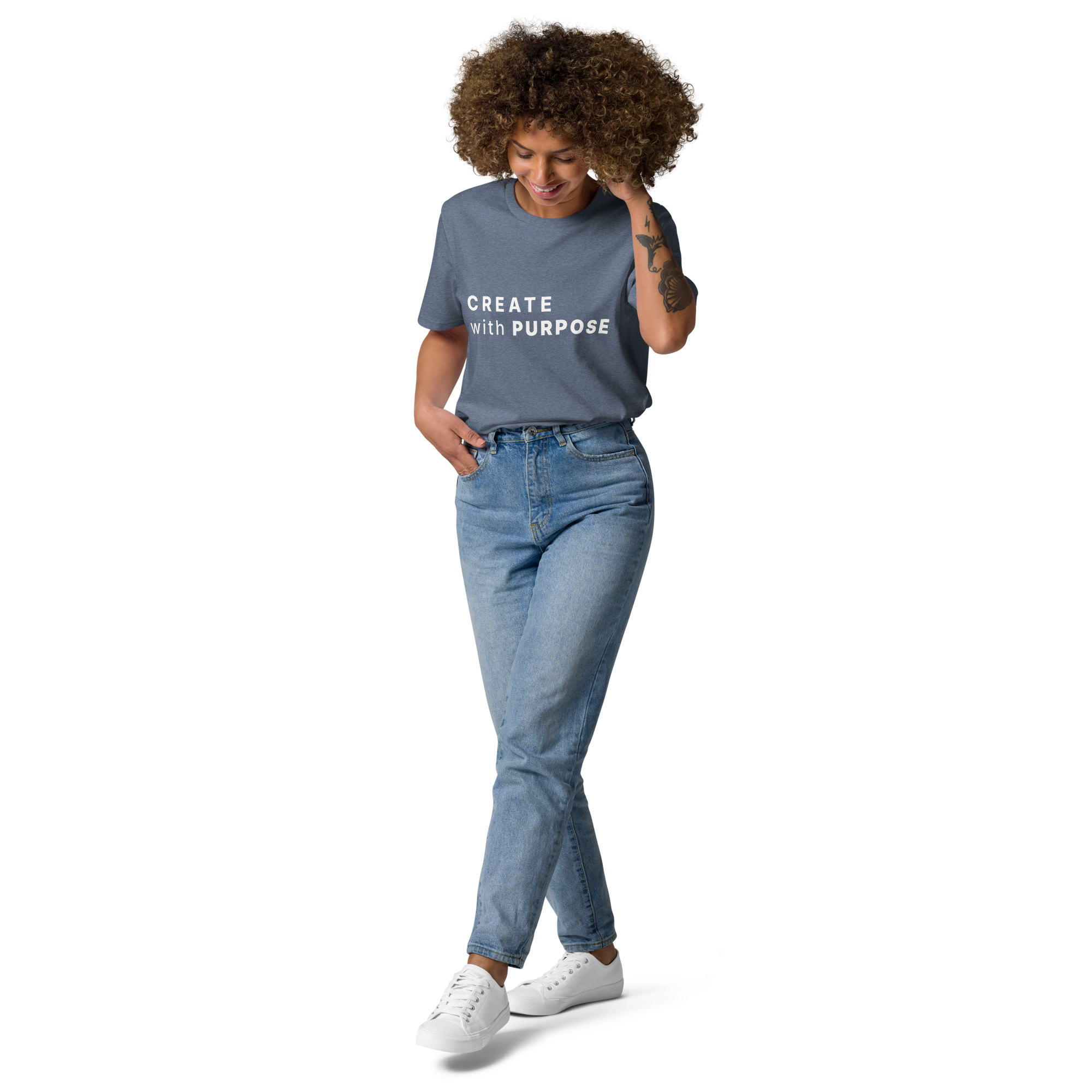 Dark Heather Blue organic cotton t-shirt lifestyle photo of woman wearing “CREATE with PURPOSE”