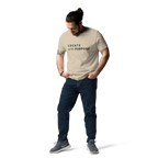 Desert Dust organic cotton t-shirt lifestyle photo of man wearing “CREATE with PURPOSE”