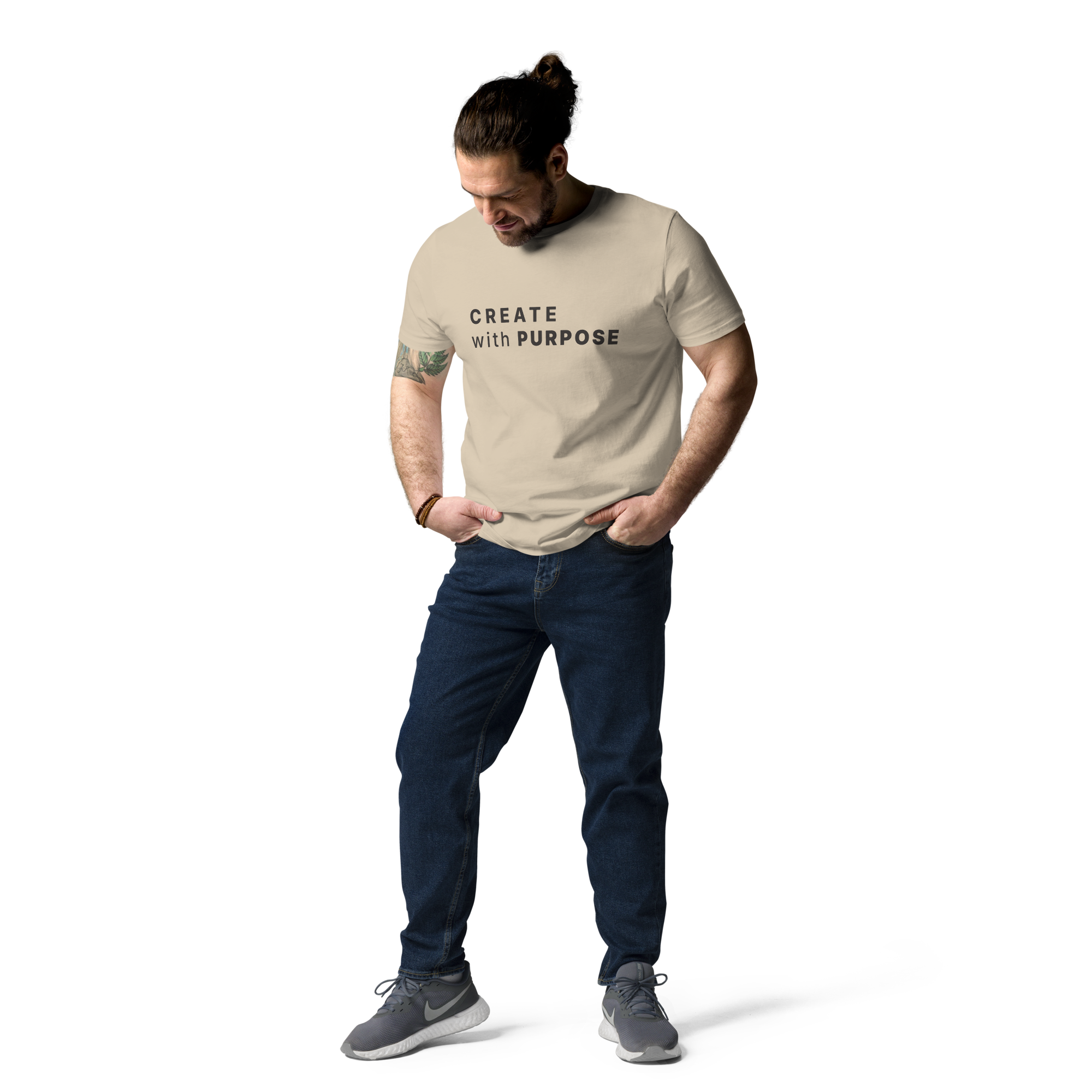Desert Dust organic cotton t-shirt lifestyle photo of man wearing “CREATE with PURPOSE”
