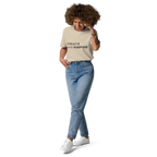 Desert Dust organic cotton t-shirt lifestyle photo of woman wearing “CREATE with PURPOSE”