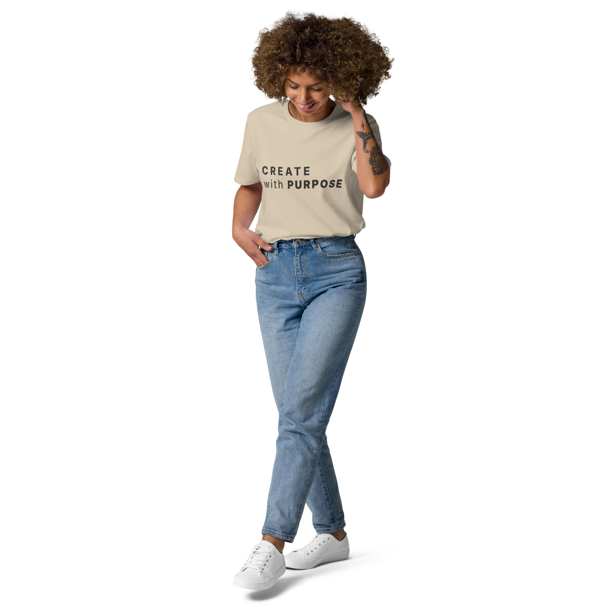 Desert Dust organic cotton t-shirt lifestyle photo of woman wearing “CREATE with PURPOSE”