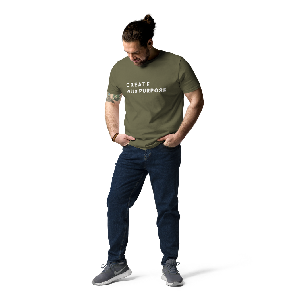 Khaki organic cotton t-shirt lifestyle photo of man wearing “CREATE with PURPOSE”