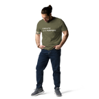 Khaki organic cotton t-shirt lifestyle photo of man wearing “CREATE with PURPOSE”