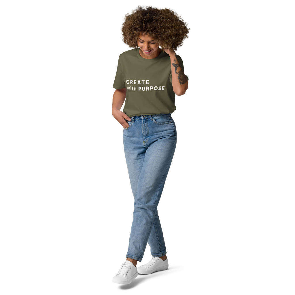 Khaki organic cotton t-shirt lifestyle photo of woman wearing “CREATE with PURPOSE”