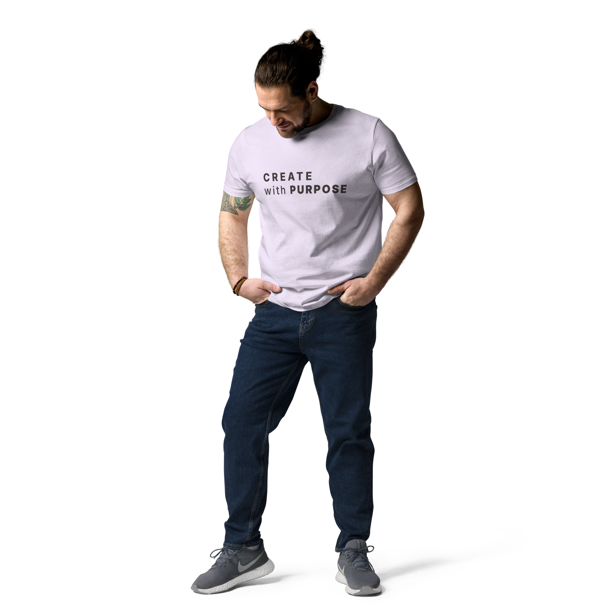 Lavender organic cotton t-shirt lifestyle photo of man wearing “CREATE with PURPOSE”