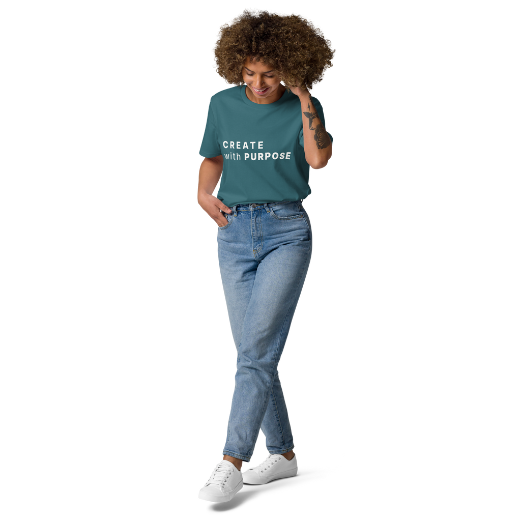 Stargazer organic cotton t-shirt lifestyle photo of woman wearing “CREATE with PURPOSE”