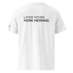 White organic cotton t-shirt back view with “Less Noise More Meaning” slogan – The Pixel Wolf